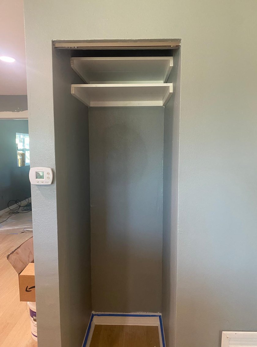 Built-in pantry alcove freshly painted gray