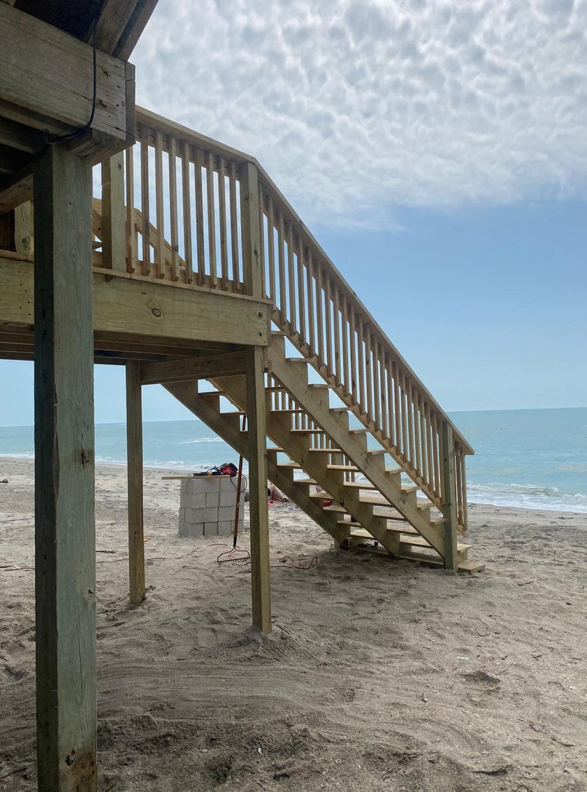 Newly built oceanfront wood deck and staircase